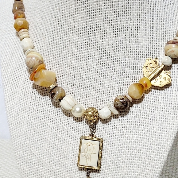 Silver and Gold Tone Necklace with a Bird, Butterfly and Beads. - Picture 4 of 7